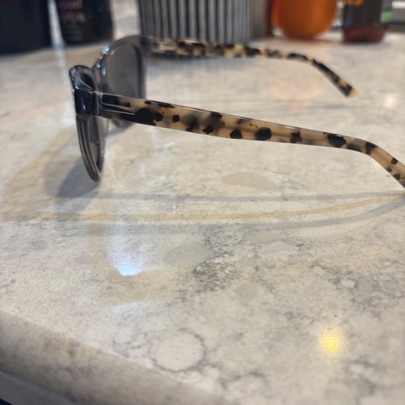 Ted Baker London polarized Sun glasses Translucent gray frame with Leopard arms
